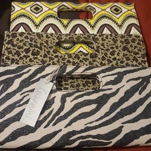Total of three clutch bags